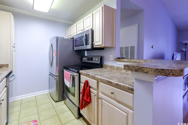 3774 Hitchcock Way Unit 836, Myrtle Beach, SC 29572 - kitchen featuring appliances with stainless steel finishes, ornamental molding, light tile patterned floors, and a peninsula