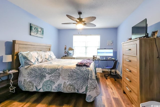 3774 Hitchcock Way Unit 836, Myrtle Beach, SC 29572 - bedroom featuring wood finished floors, an office area, and ceiling fan