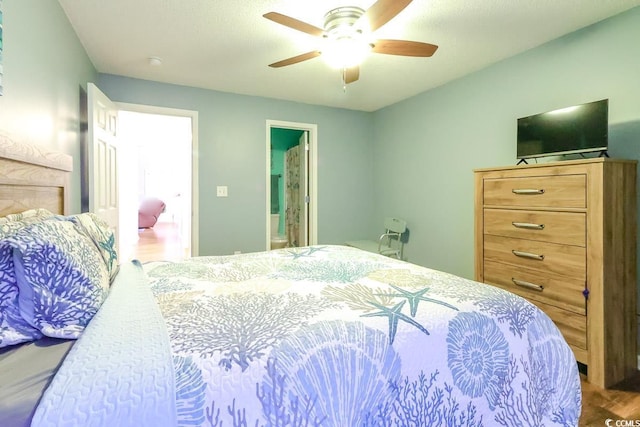 3774 Hitchcock Way Unit 836, Myrtle Beach, SC 29572 - bedroom with wood finished floors, connected bathroom, and ceiling fan