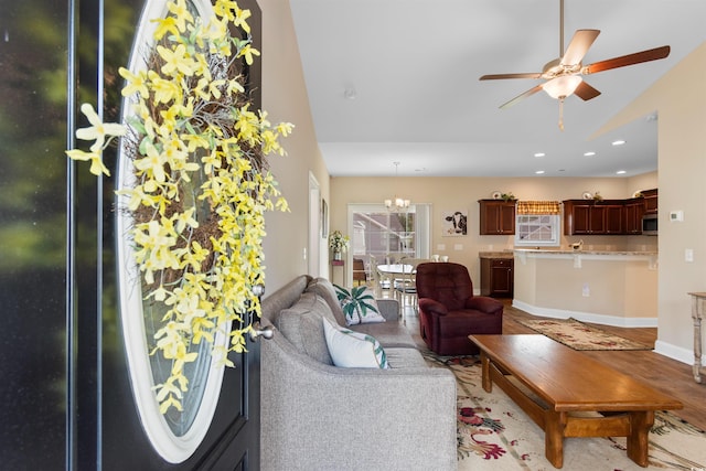 177 Baylee Cir, Galivants Ferry, SC 29544 - living area featuring ceiling fan, lofted ceiling, recessed lighting, wood finished floors, and a chandelier