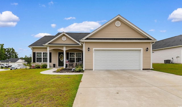 177 Baylee Cir, Galivants Ferry, SC 29544 - view of front of house with a front yard, concrete driveway, covered porch, and a garage