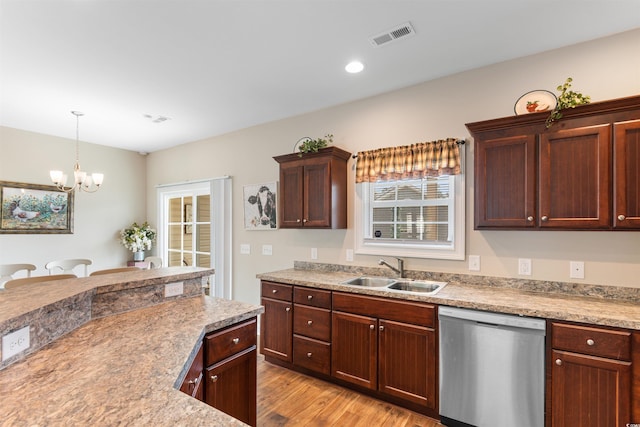 177 Baylee Cir, Galivants Ferry, SC 29544 - kitchen with dishwasher, light wood finished floors, a chandelier, and light countertops