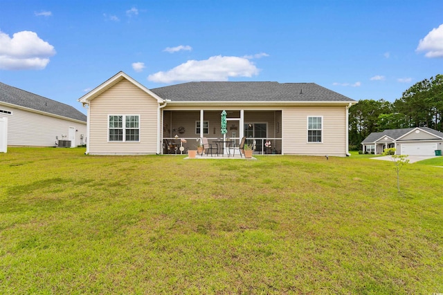 177 Baylee Cir, Galivants Ferry, SC 29544 - back of house featuring a lawn, a patio, and a sunroom