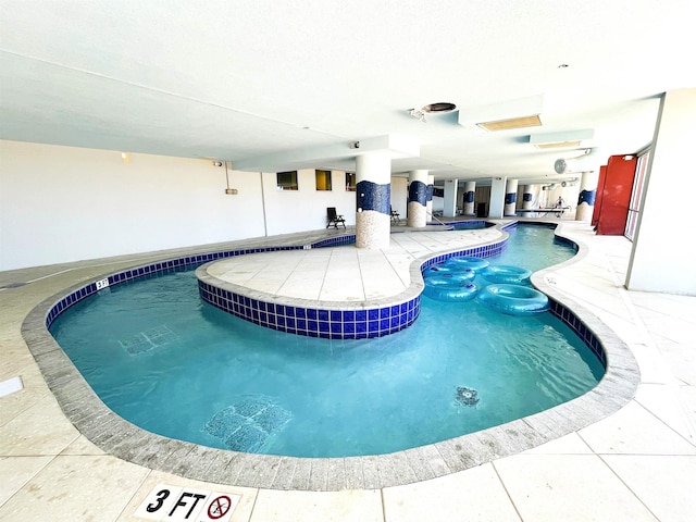 2007 S Ocean Blvd Unit 1506, Myrtle Beach, SC 29577 - indoor community pool with a patio