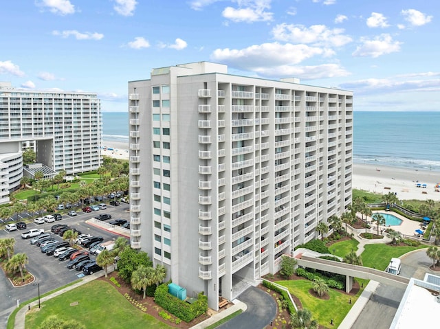 9820 Queensway Blvd Unit 502, Myrtle Beach, SC 29572 - view of apartment building / complex with a water view and uncovered parking