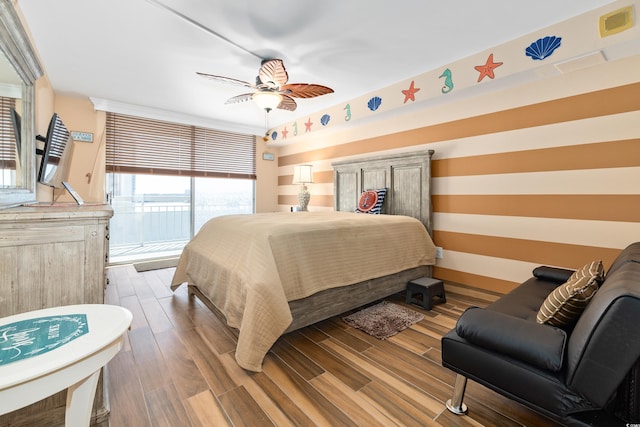 9820 Queensway Blvd Unit 502, Myrtle Beach, SC 29572 - bedroom featuring wood finished floors, ceiling fan, and access to outside