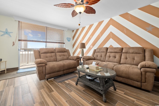9820 Queensway Blvd Unit 502, Myrtle Beach, SC 29572 - living room with a ceiling fan, wallpapered walls, wood finished floors, and baseboards