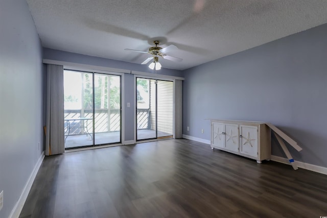 1100 Possum Trot Dr Unit D106, North Myrtle Beach, SC 29582 - spare room featuring a ceiling fan, a textured ceiling, and dark wood finished floors