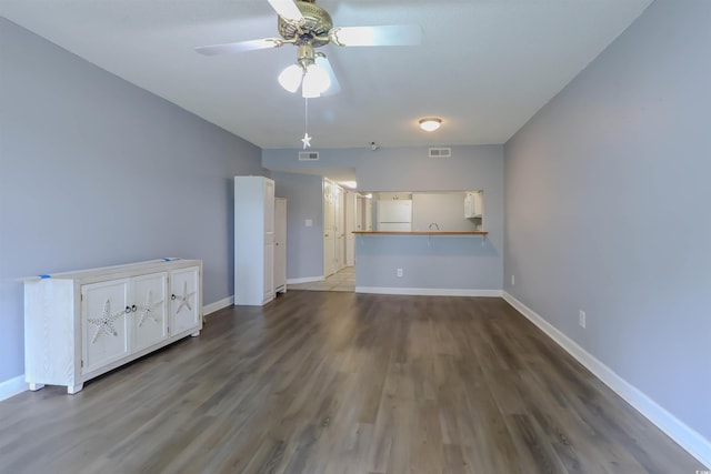 1100 Possum Trot Dr Unit D106, North Myrtle Beach, SC 29582 - unfurnished living room featuring wood finished floors and a ceiling fan