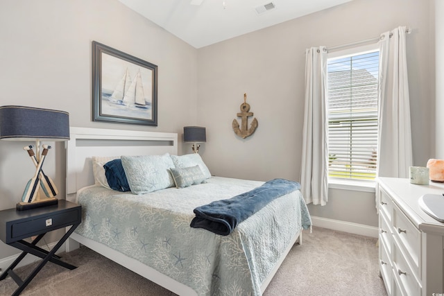 314 Bumble Cir, Murrells Inlet, SC 29576 - bedroom with multiple windows and light carpet