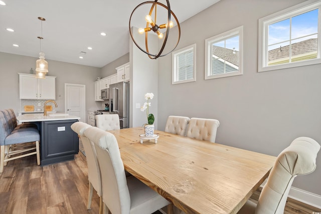 314 Bumble Cir, Murrells Inlet, SC 29576 - dining space with dark wood-style floors, recessed lighting, and a chandelier