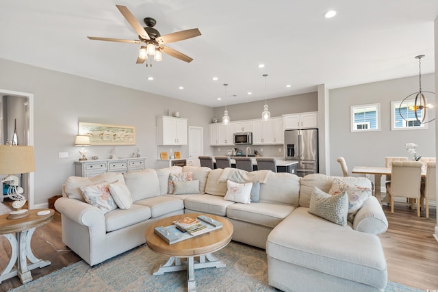 314 Bumble Cir, Murrells Inlet, SC 29576 - living area featuring wood finished floors, a ceiling fan, and recessed lighting
