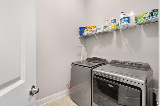 314 Bumble Cir, Murrells Inlet, SC 29576 - laundry area featuring washing machine and dryer and baseboards