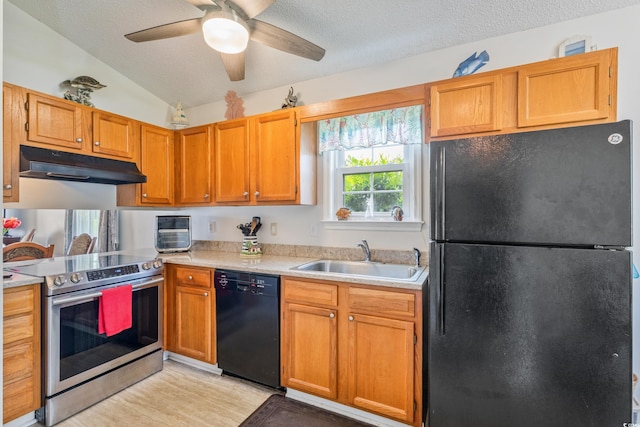 1407 Sunningdale Ln, Myrtle Beach, SC 29588 - kitchen with black appliances, under cabinet range hood, light countertops, ceiling fan, and a textured ceiling