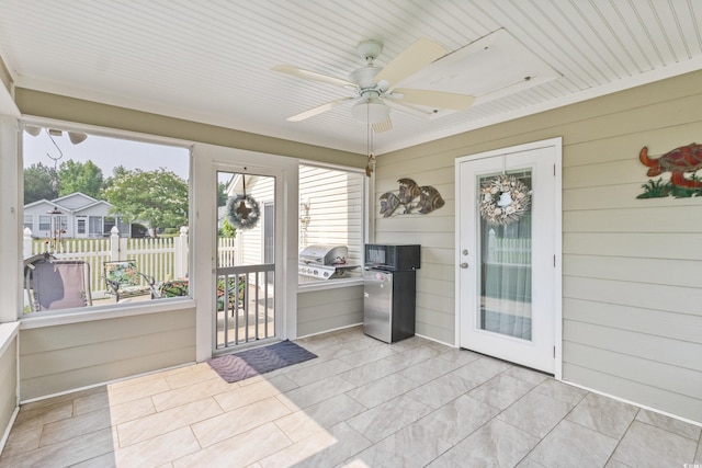 1407 Sunningdale Ln, Myrtle Beach, SC 29588 - sunroom featuring ceiling fan and exterior kitchen