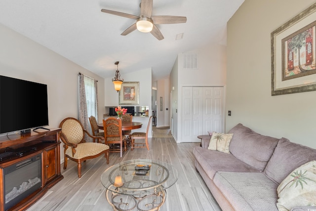 1407 Sunningdale Ln, Myrtle Beach, SC 29588 - living area with lofted ceiling, light wood-style floors, and ceiling fan