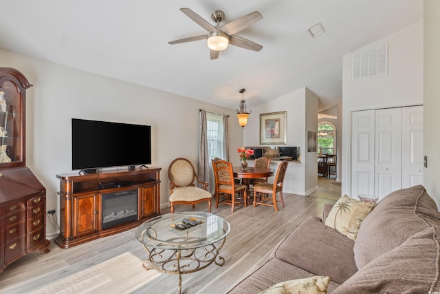 1407 Sunningdale Ln, Myrtle Beach, SC 29588 - living area featuring lofted ceiling, plenty of natural light, light wood-style flooring, and ceiling fan