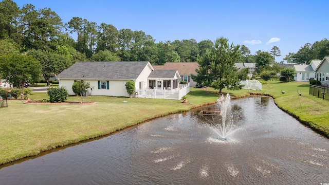 1407 Sunningdale Ln, Myrtle Beach, SC 29588 - view of front of home with dirt driveway, a water view, and a front yard