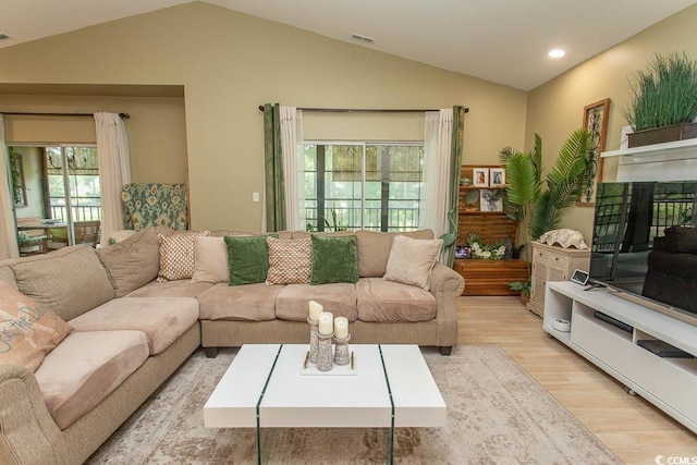 108 Pipers Ln Unit 108, Myrtle Beach, SC 29575 - living area featuring vaulted ceiling, wood finished floors, plenty of natural light, and recessed lighting