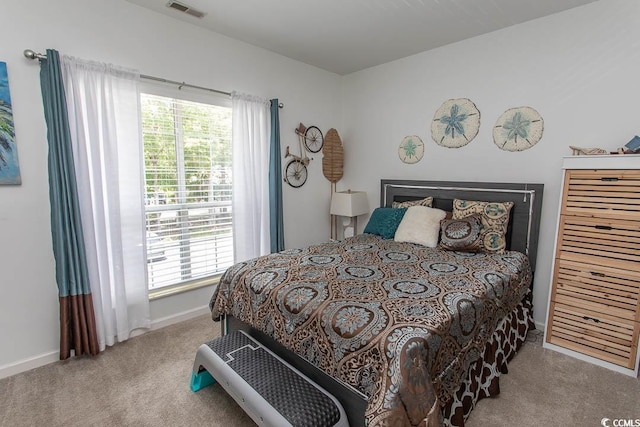108 Pipers Ln Unit 108, Myrtle Beach, SC 29575 - bedroom featuring carpet floors, baseboards, and multiple windows