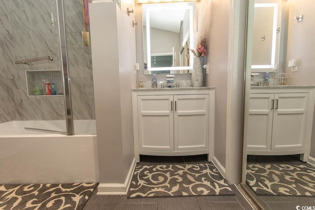 108 Pipers Ln Unit 108, Myrtle Beach, SC 29575 - bathroom featuring vanity, combined bath / shower with glass door, and baseboards