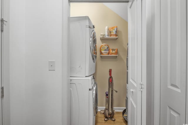 3547 Ladybank Loop, Myrtle Beach, SC 29577 - laundry area featuring stacked washing machine and dryer and wood finished floors