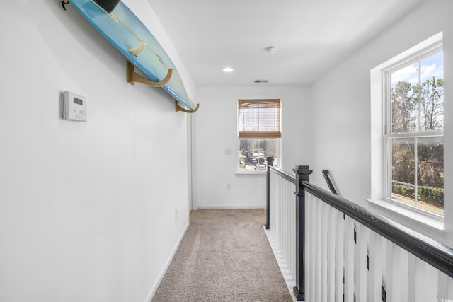 3547 Ladybank Loop, Myrtle Beach, SC 29577 - hallway with light colored carpet, healthy amount of natural light, an upstairs landing, baseboards, and recessed lighting