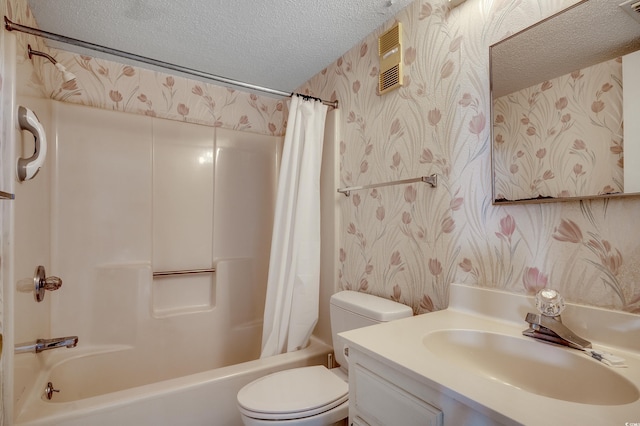 912 N Waccamaw Dr Unit 904, Garden City Beach, SC 29576 - bathroom featuring wallpapered walls, a textured ceiling, toilet, shower / tub combo, and vanity