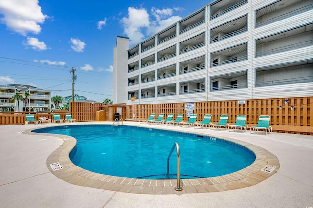 912 N Waccamaw Dr Unit 904, Garden City Beach, SC 29576 - community pool featuring a patio
