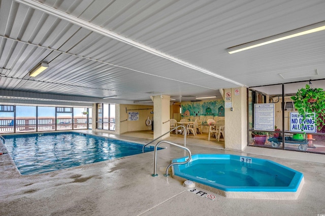 912 N Waccamaw Dr Unit 904, Garden City Beach, SC 29576 - indoor community pool with a patio