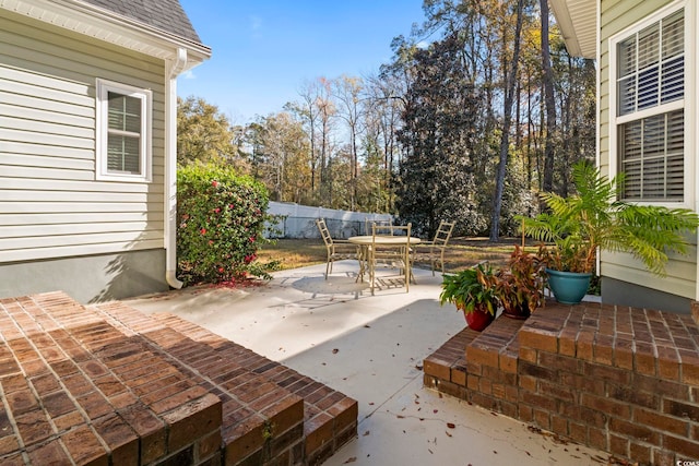 1044 Martin Ln, Conway, SC 29526 - fenced backyard with a patio and outdoor dining area