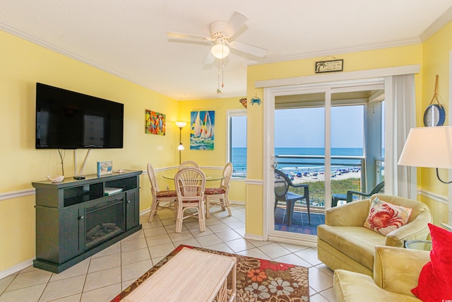 4525 S Ocean Blvd Unit 406, North Myrtle Beach, SC 29582 - living room with light tile patterned flooring, a water view, ceiling fan, baseboards, and crown molding