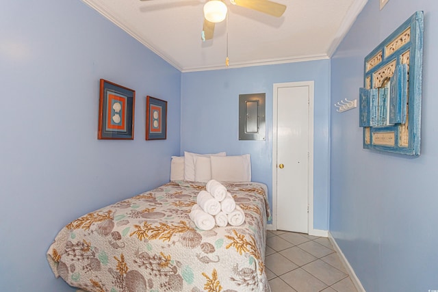 4525 S Ocean Blvd Unit 406, North Myrtle Beach, SC 29582 - bedroom featuring crown molding, tile patterned flooring, electric panel, a ceiling fan, and baseboards