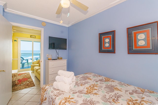 4525 S Ocean Blvd Unit 406, North Myrtle Beach, SC 29582 - bedroom with crown molding, tile patterned flooring, and ceiling fan