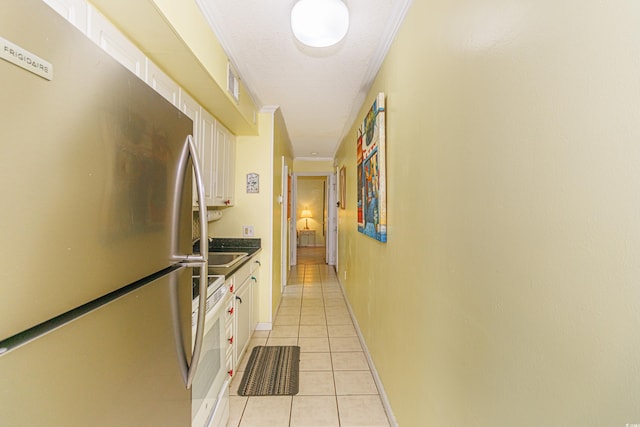 4525 S Ocean Blvd Unit 406, North Myrtle Beach, SC 29582 - corridor with light tile patterned floors, baseboards, and a sink
