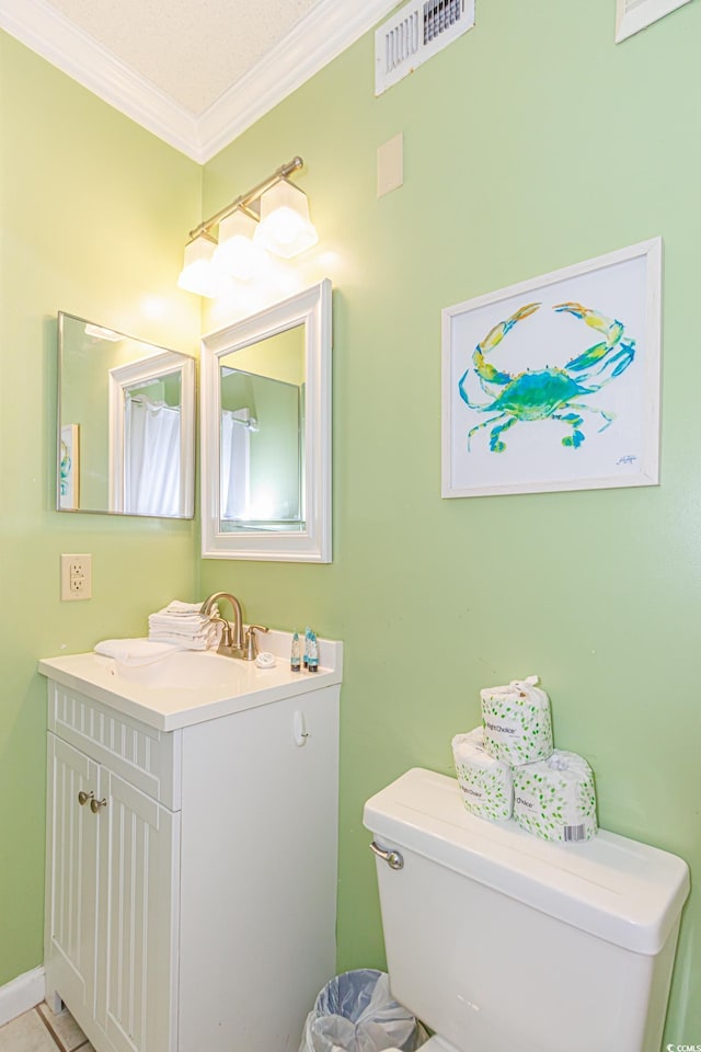 4525 S Ocean Blvd Unit 406, North Myrtle Beach, SC 29582 - bathroom with toilet, ornamental molding, and vanity