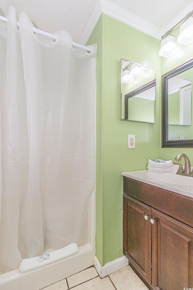 4525 S Ocean Blvd Unit 406, North Myrtle Beach, SC 29582 - bathroom featuring ornamental molding, a shower with shower curtain, vanity, tile patterned floors, and a textured ceiling