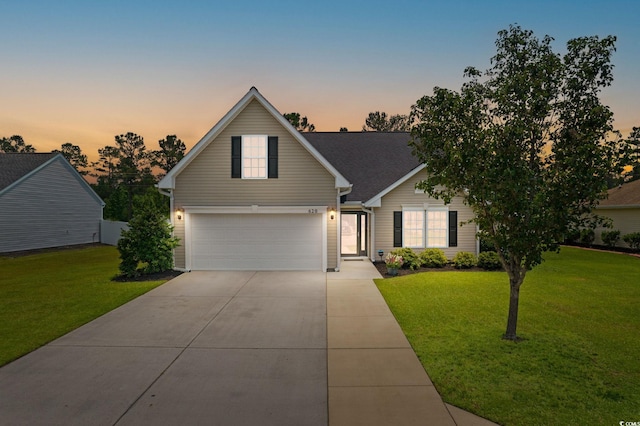 620 Seth Ln, Longs, SC 29568 - traditional-style house with a garage, concrete driveway, and a lawn