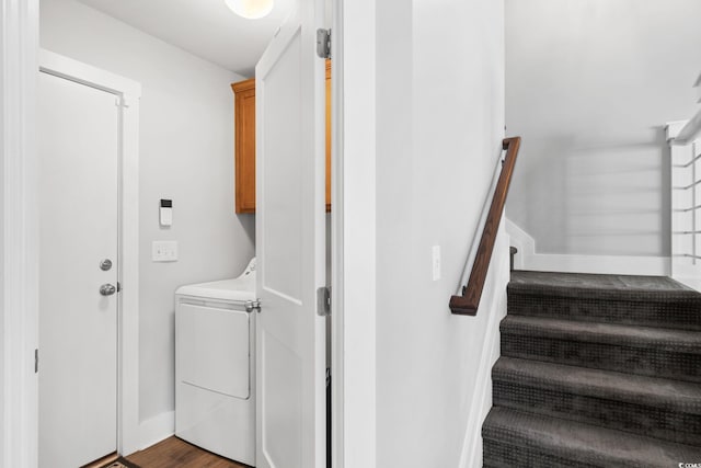 620 Seth Ln, Longs, SC 29568 - laundry area featuring washer / dryer, cabinet space, baseboards, and wood finished floors