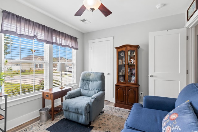 620 Seth Ln, Longs, SC 29568 - sitting room featuring wood finished floors, ceiling fan, and baseboards