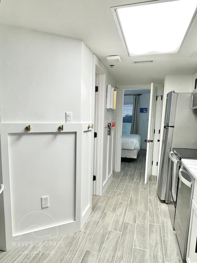 161 Seawatch Dr Unit 710, Myrtle Beach, SC 29572 - corridor with wood tiled floors