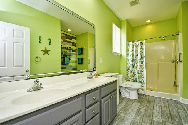 1412 Reid Ct, Myrtle Beach, SC 29588 - full bath featuring toilet, wood finished floors, double vanity, and a shower with curtain