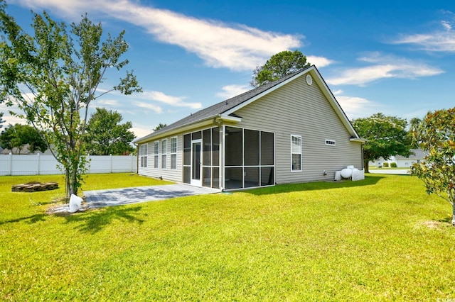 1412 Reid Ct, Myrtle Beach, SC 29588 - back of property featuring a sunroom and a patio area