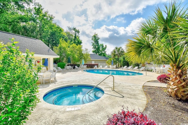 1412 Reid Ct, Myrtle Beach, SC 29588 - community pool with a patio and a hot tub