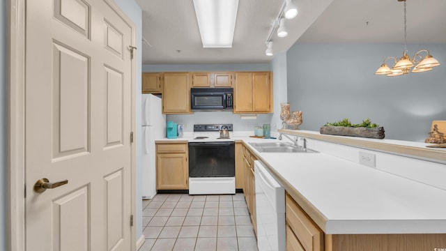 1221 Tidewater Dr Unit 122, North Myrtle Beach, SC 29582 - kitchen featuring white appliances, a sink, light brown cabinetry, a peninsula, and light tile patterned flooring