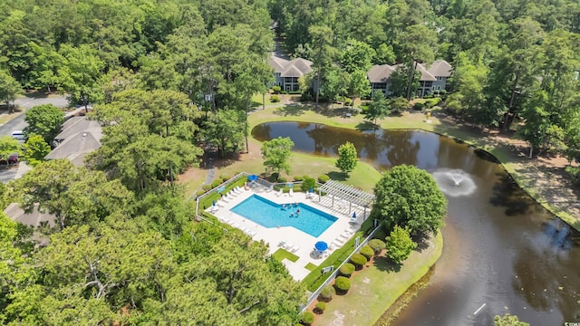 1221 Tidewater Dr Unit 122, North Myrtle Beach, SC 29582 - aerial view of a large body of water, a pool, and a heavily wooded area