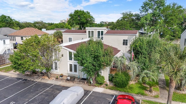 800 9th Ave S Unit E-4, North Myrtle Beach, SC 29582 - view of building exterior featuring uncovered parking