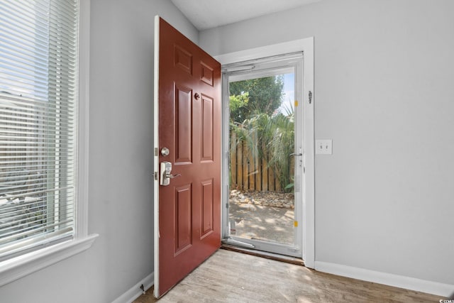 800 9th Ave S Unit E-4, North Myrtle Beach, SC 29582 - entryway featuring light wood finished floors and baseboards