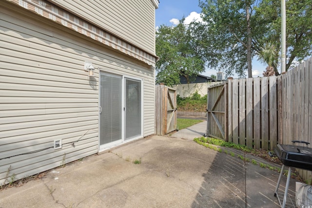 800 9th Ave S Unit E-4, North Myrtle Beach, SC 29582 - view of patio / terrace with a grill