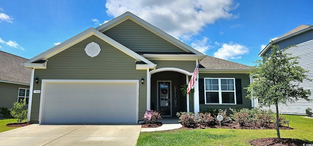 784 Flowering Branch Ave, Little River, SC 29566 - view of front of property with driveway, an attached garage, a front yard, and a shingled roof